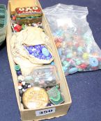 A quantity of old and antique glass beads, many in the style of marbles Condition: Mostly good but