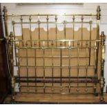 An Edwardian brass double bedstead, with ring turned finials and squared bars, W.156cm H.