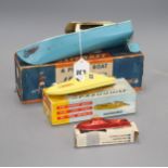 A boxed Jetex plastic fuel propelled model boat, a Jetcraft tinplate burner propelled model power