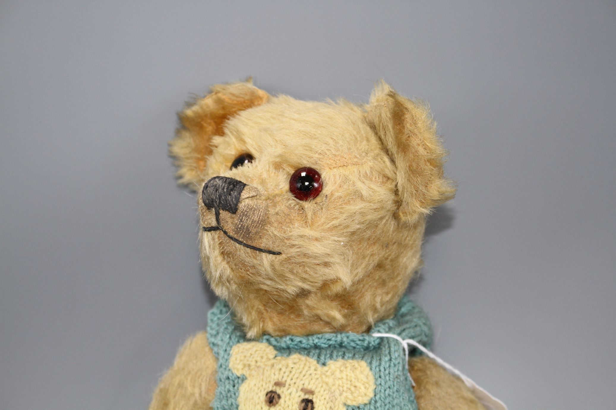 An Omega bear c.1950's, 16in., rexine pads, general hair loss - Image 2 of 5