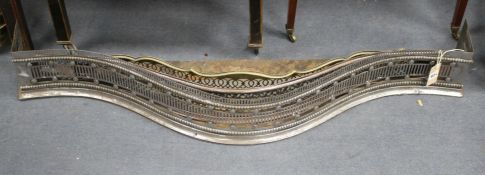 A George III cut steel fender, W.116cm, two other fenders and four assorted brass jardinieres