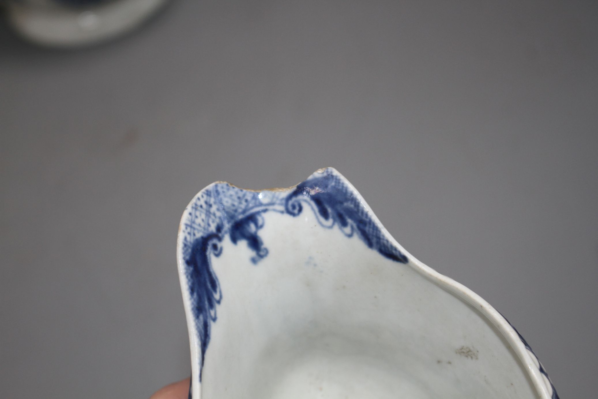 A Lowestoft blue and white sauceboat, c.1770 and two Worcester blue and white sauceboats, c.1758- - Image 2 of 6