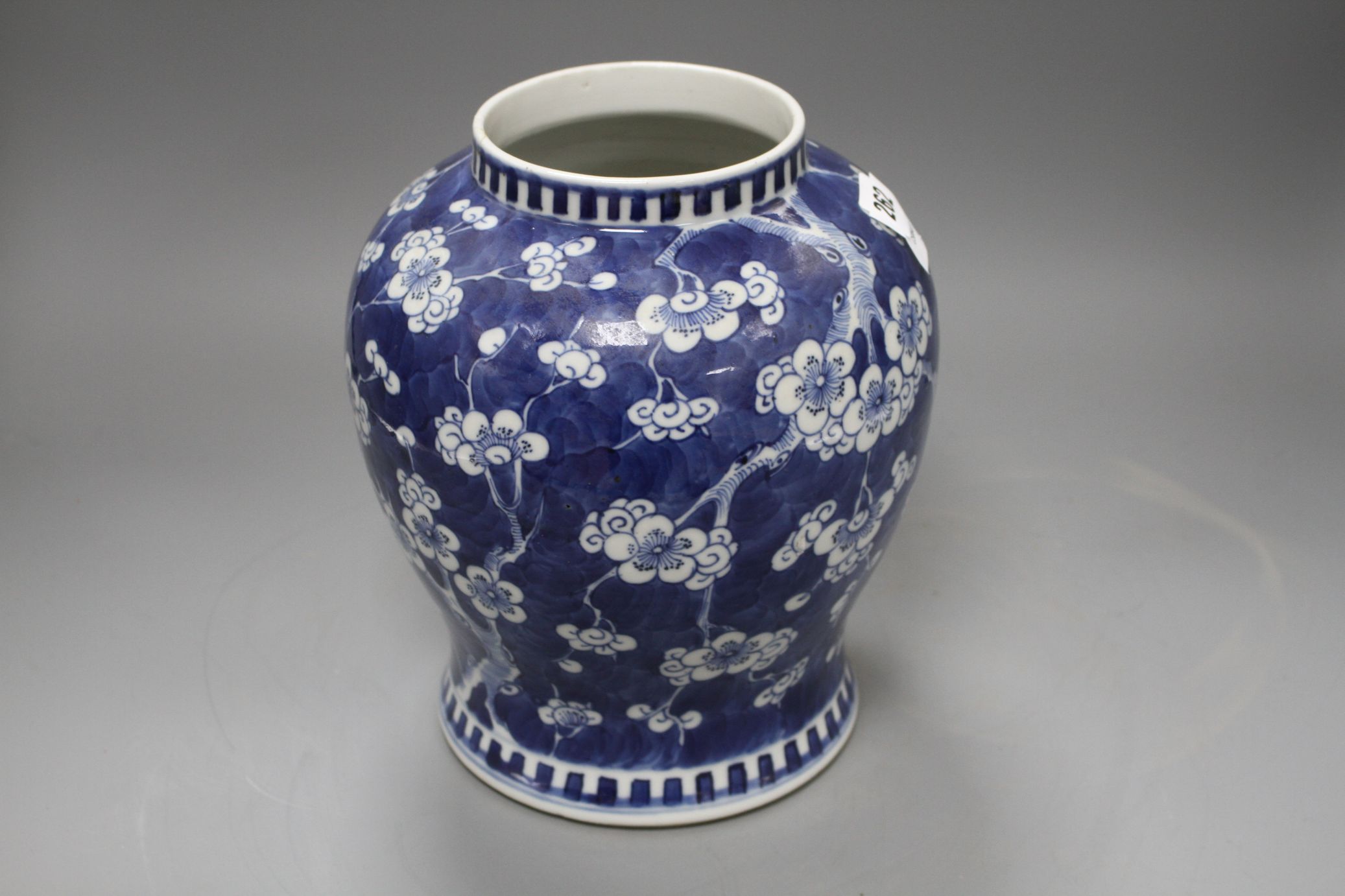 A Chinese blue and white prunus pattern baluster vase, height 25cm Condition: One small chip glued - Image 2 of 4