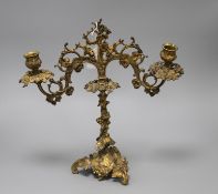 A 19th century French ormolu twin branch candelabrum, modelled with vines and scrolls, height 34cm