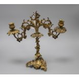 A 19th century French ormolu twin branch candelabrum, modelled with vines and scrolls, height 34cm