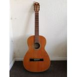 A Spanish guitar Condition: Some chips and scratches to body work, some nicotine stains and odour.