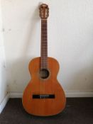 A Spanish guitar Condition: Some chips and scratches to body work, some nicotine stains and odour.