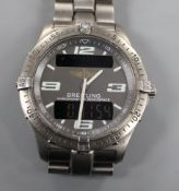 A gentleman's steel Breitling Aerospace quartz wrist watch, on Breitling bracelet. Condition: Case