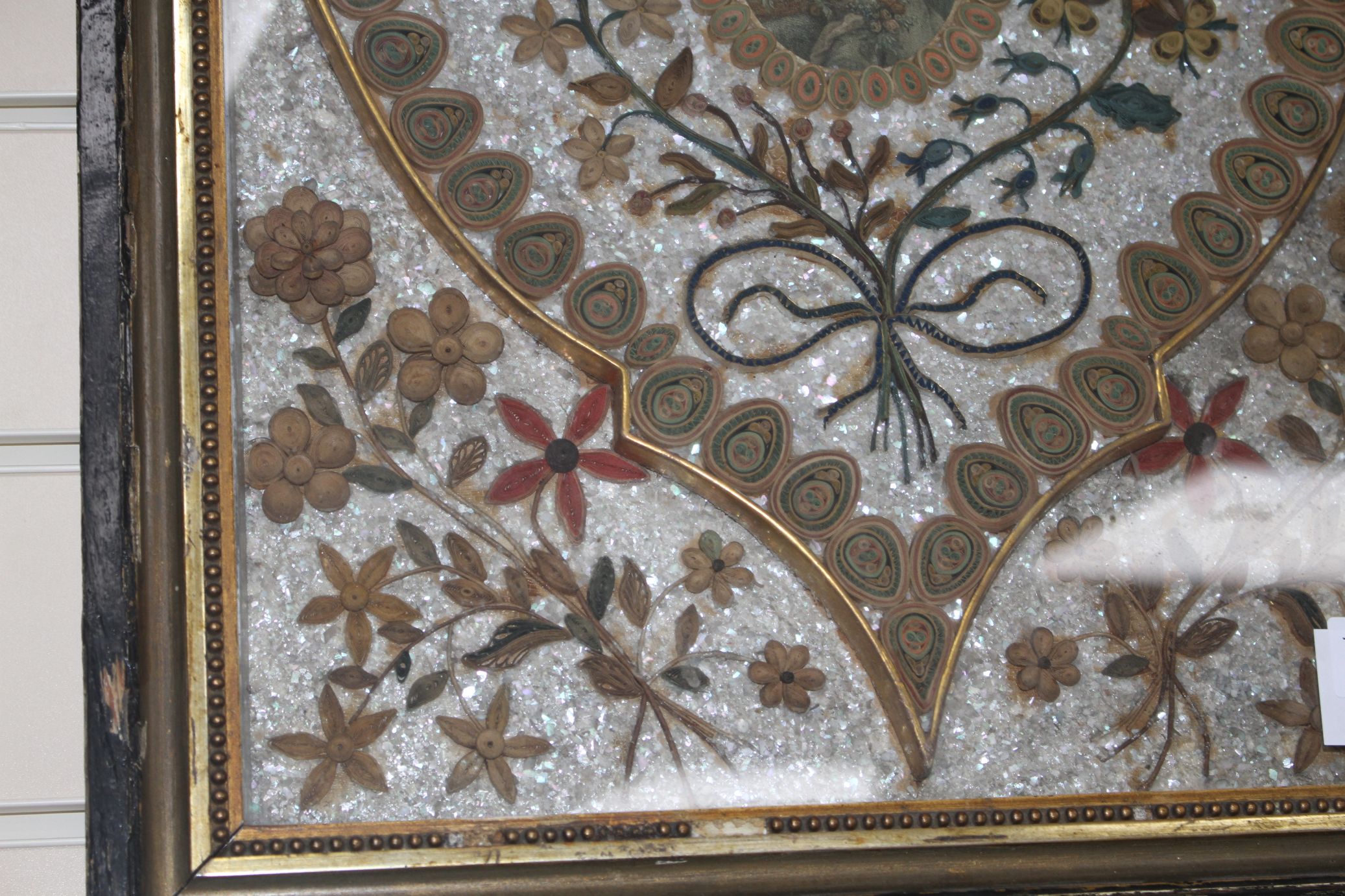 An early 19th century paper scroll work panel, formed with a printed miniature within a floral - Image 3 of 6