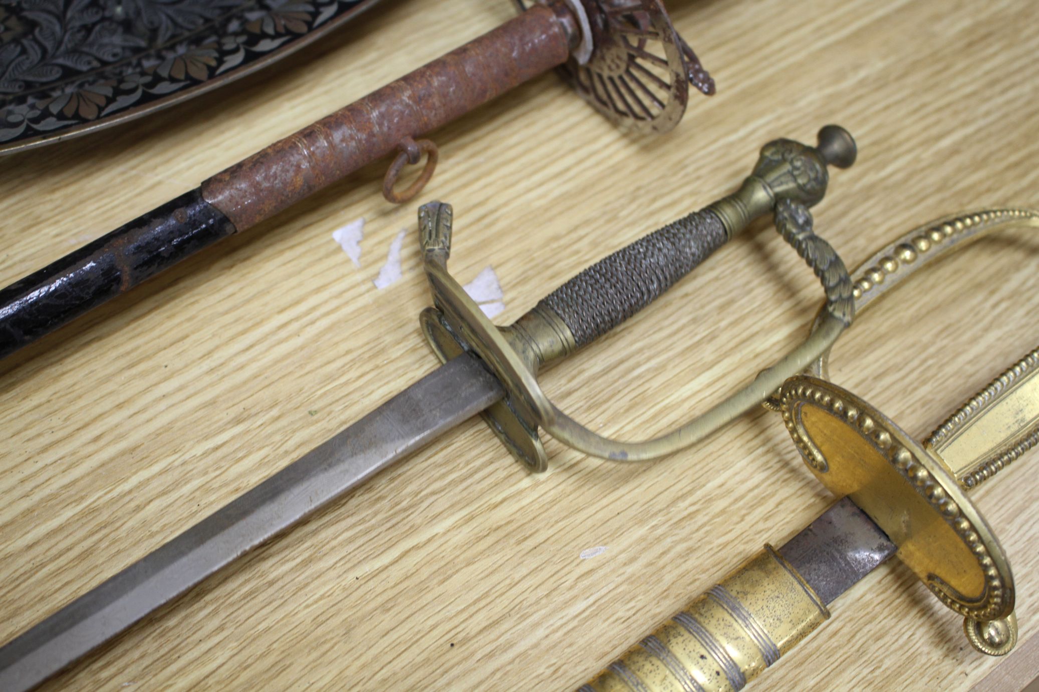 A cut steel dress sword by Ede & Ravenscroft of London and two brass hilted dress swords Condition:- - Image 26 of 30