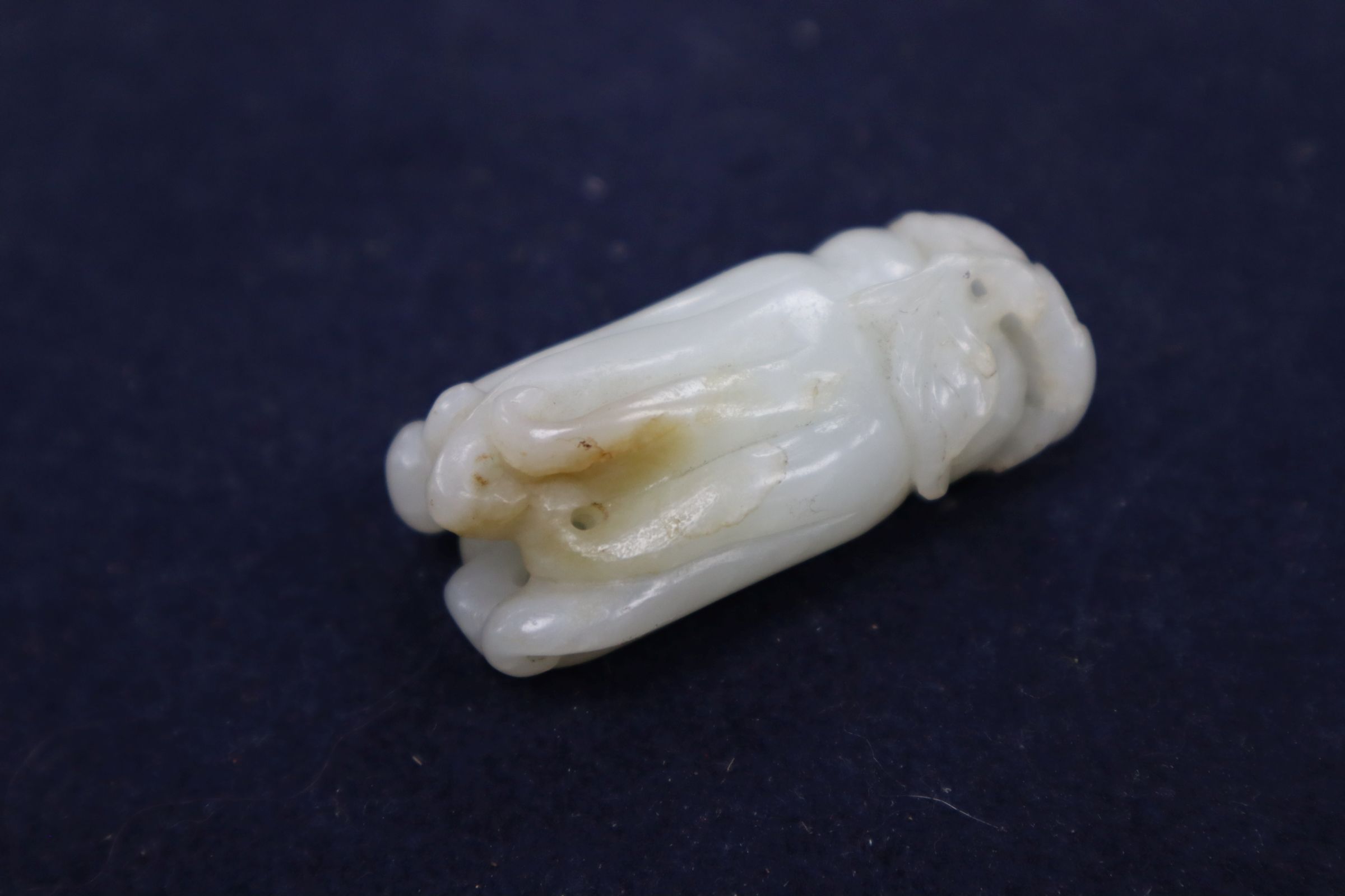 A Chinese jade carving of a finger citron, length 5.5cm, width 2.5cm, depth 2cm Condition: some - Image 11 of 11