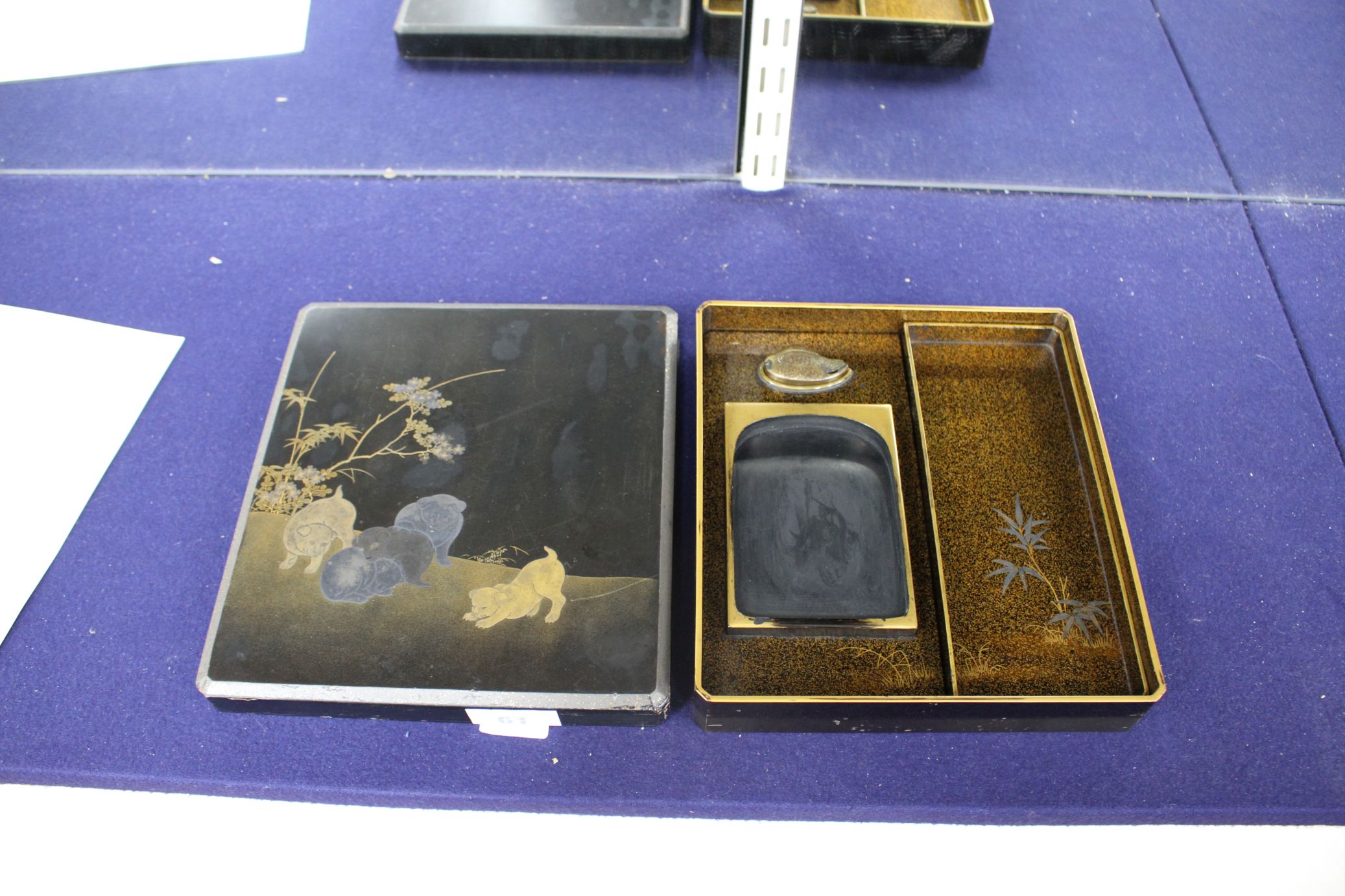 A Japanese Meiji lacquer writing box, the lid decorated with five puppies playing in a garden, - Image 3 of 5