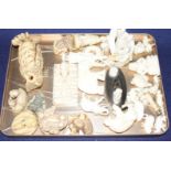 A group of assorted pre WWII ivory carving, mostly animals, together with several resin carvings