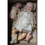 A Heubach character doll, intaglio eyes on shoulder plate broken, 18in., a Heubach character baby,