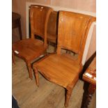 A pair of Asian hardwood hall chairs, with foliate carved frames, W.57cm D.52cm H.115cm Condition: