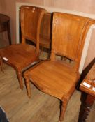 A pair of Asian hardwood hall chairs, with foliate carved frames, W.57cm D.52cm H.115cm Condition: