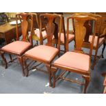A set of six Queen Anne style mahogany dining chairs, including two carvers, with drop-in seats,