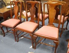 A set of six Queen Anne style mahogany dining chairs, including two carvers, with drop-in seats,