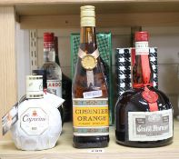 A collection of assorted spirits and liqueurs, comprising: - Capucine - Amadeus- Luxardo Sambuca-