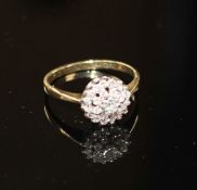 A modern 9ct gold and diamond cluster ring, size O, gross weight 2.2 grams. Condition: Three of
