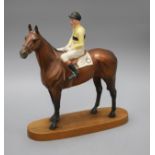 A Beswick model of Arkle with Pat Taaffe up, overall height 32cm Condition: Reins have broken,
