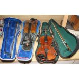A violin with two piece back and bow, and a child's violin with bow, both with cases Condition:-
