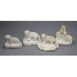 A Samuel Alcock porcelain figure of a recumbent ewe, an Alcock type ewe and two Staffordshire