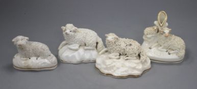 A Samuel Alcock porcelain figure of a recumbent ewe, an Alcock type ewe and two Staffordshire