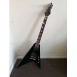 A Shine Offset Flying-V style electric guitar Condition: Electrics are working, tone pot crackles,
