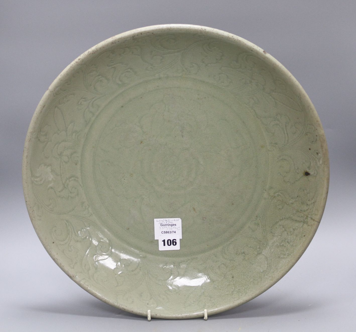 A 15th / 16th century Longquan celadon dish, incised with flowers, diameter 43cm, height 8.5cm - Image 7 of 12