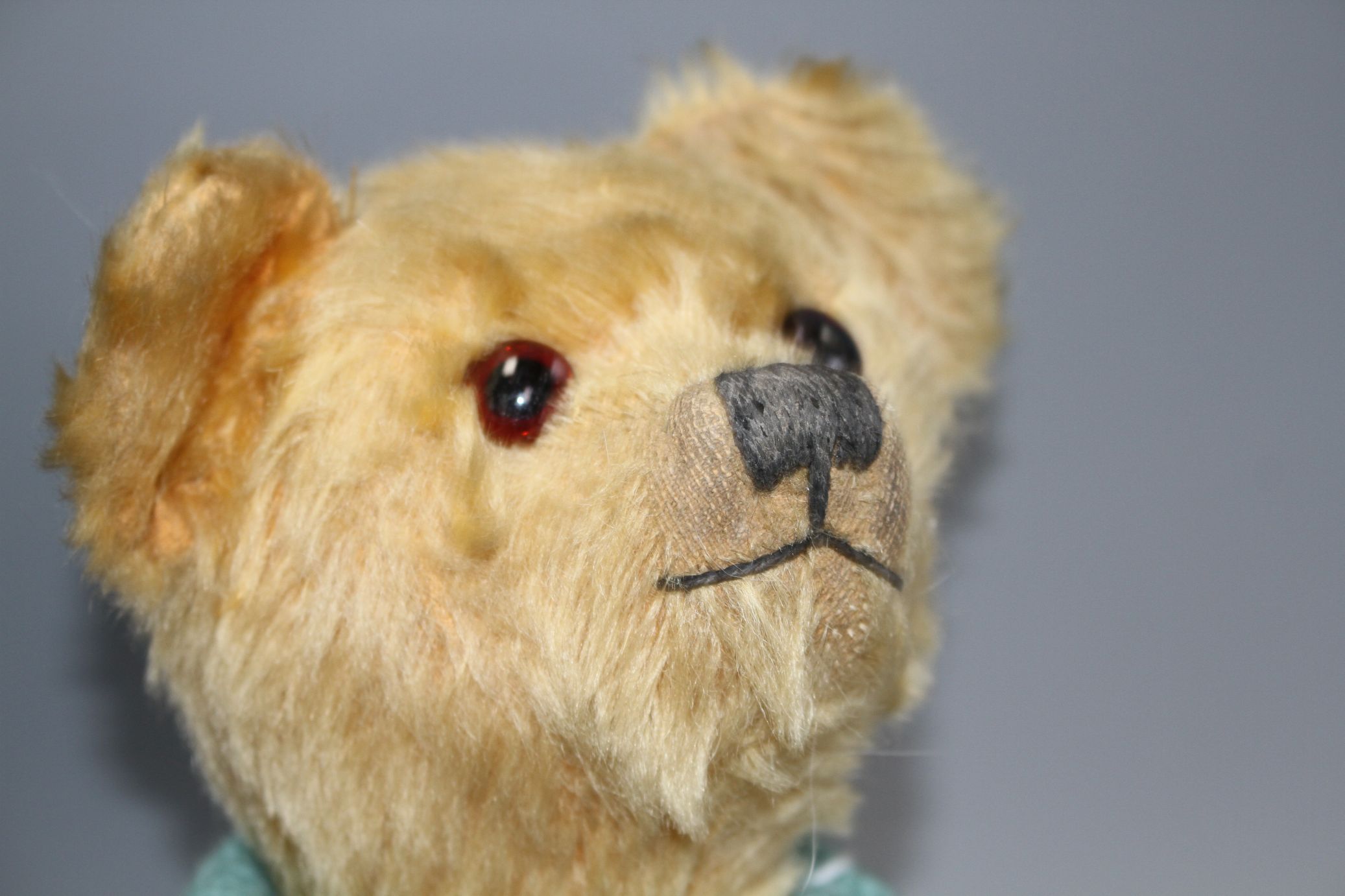 An Omega bear c.1950's, 16in., rexine pads, general hair loss - Image 4 of 5
