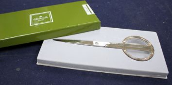 A cased pair of Christofle scissors, 20.5cm Condition: boxed in mint condition