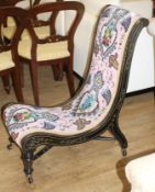 A late Victorian beadwork slipper chair, with polychrome beadwork upholstery Condition: Good