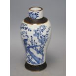 A Chinese crackle glaze baluster vase, decorated with peacocks and prunus blossom, height 25.5cm