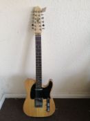 A Gear 4 Music electric 12 string guitar Condition: Electrics all working, rust around the bridge,