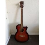 An Eagle Electro acoustic guitar Condition: Electrics are working, slight crackle to selectors, some