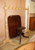 A large turned pine coat rack, W.250cm H.190cm Condition: Looks to be in good clean condition,