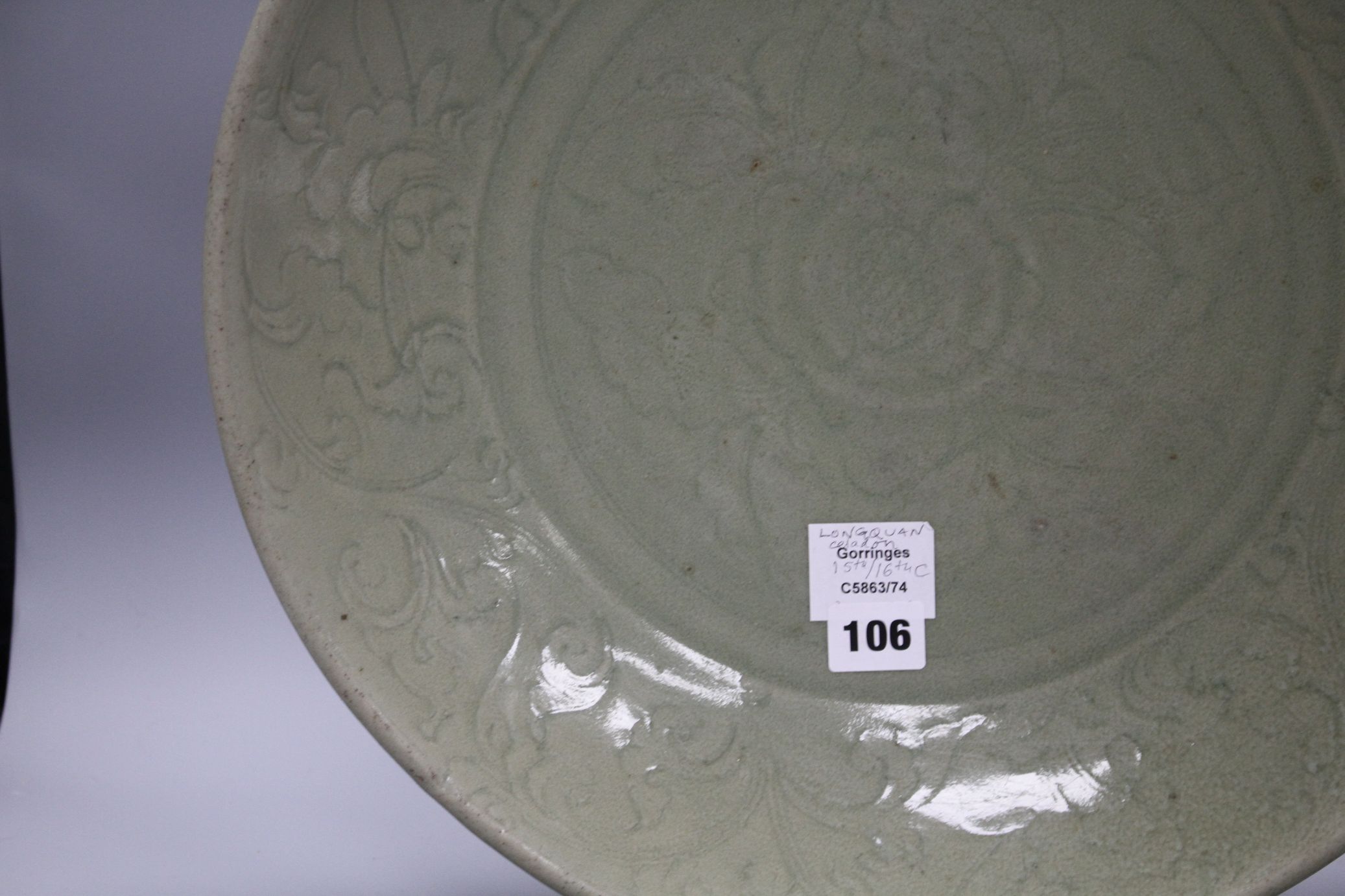 A 15th / 16th century Longquan celadon dish, incised with flowers, diameter 43cm, height 8.5cm - Image 5 of 12