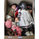 Nine plastic and composition dolls