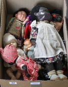 Nine plastic and composition dolls