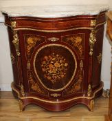 A Meuble Francais marquetry inlaid serpentine side cabinet, W.102cm D.40cm H.98cm Condition: Very