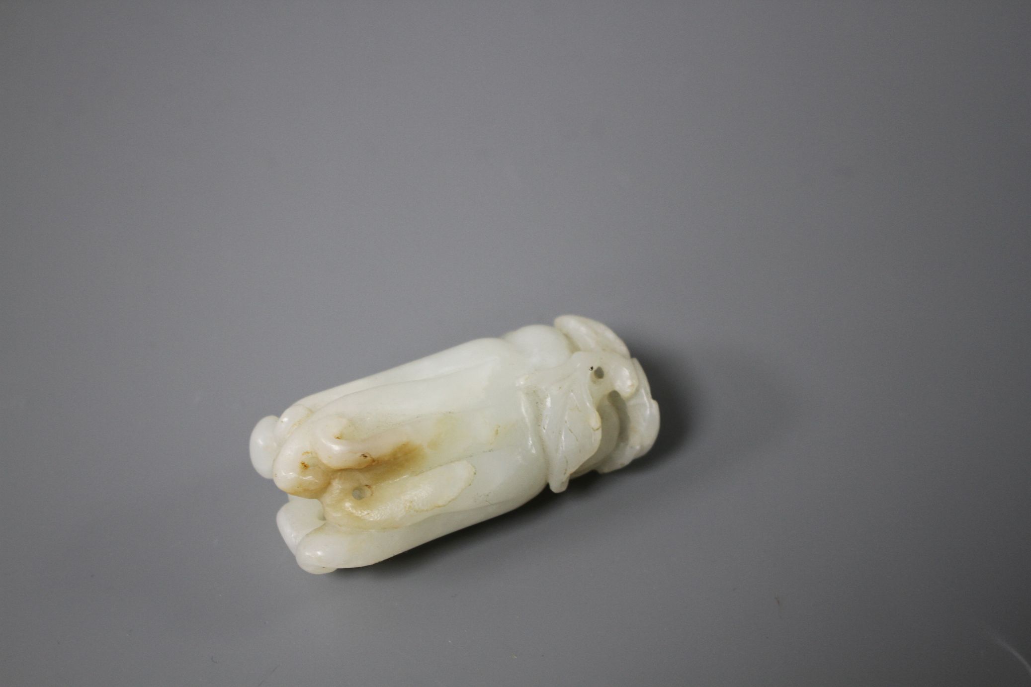 A Chinese jade carving of a finger citron, length 5.5cm, width 2.5cm, depth 2cm Condition: some - Image 4 of 11