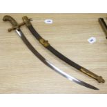 A Hungarian dress sword, 19th century, curved polished blade 60cms, gilt brass hilt with lion head