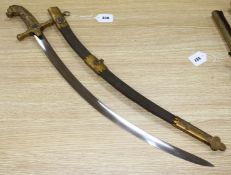 A Hungarian dress sword, 19th century, curved polished blade 60cms, gilt brass hilt with lion head