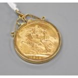 A George V 1913 gold full sovereign, in later 9ct gold pendant mount, gross weight 9.4 grams.