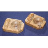 Two Robert Thompson "Mouseman" carved oak ashtrays, 10cm Condition: Both a little faded with burn