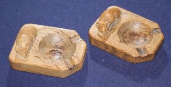 Two Robert Thompson "Mouseman" carved oak ashtrays, 10cm Condition: Both a little faded with burn