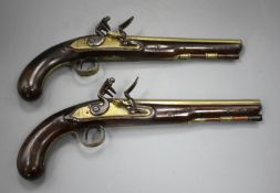 A pair of flintlock holster pistols by W. Ketland & Co, late 18th century, brass barrels 9" engraved