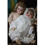 An AM 1894 doll, original body, 22in. and a Kopplesdorf doll, bent limbs, vintage original body,