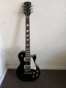 A Stagg Les Paul style electric guitar Condition: Electrics all working, some rust around selector